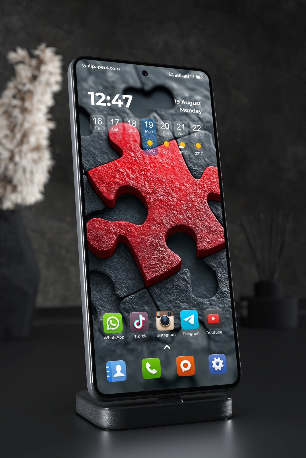 Phone Wallpaper 2604 - Red Puzzle Piece on Dark Background Close Up