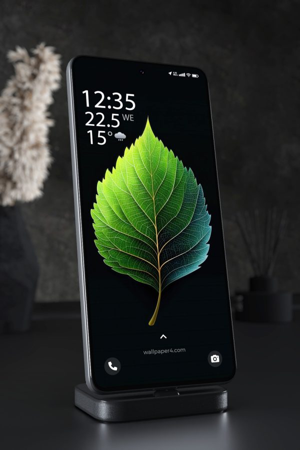 Mobile Wallpaper 3937 - Glowing Green Leaf on Dark Minimal Background
