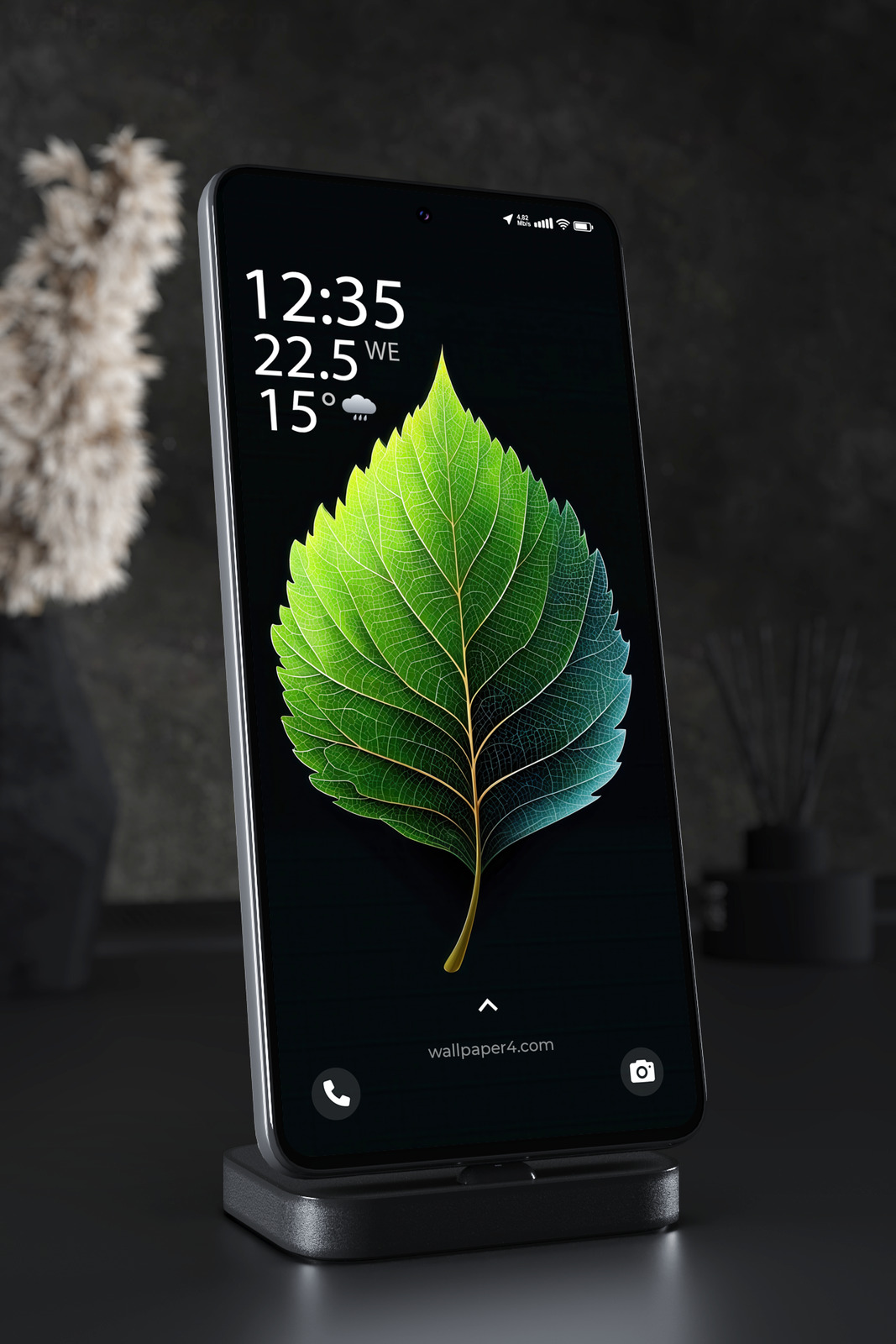 Mobile Wallpaper 3937 - Glowing Green Leaf on Dark Minimal Background
