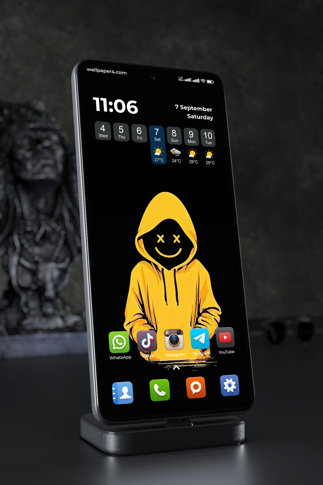 Phone Wallpaper 4123 - Yellow Hoodie Smiley Face on Black Background