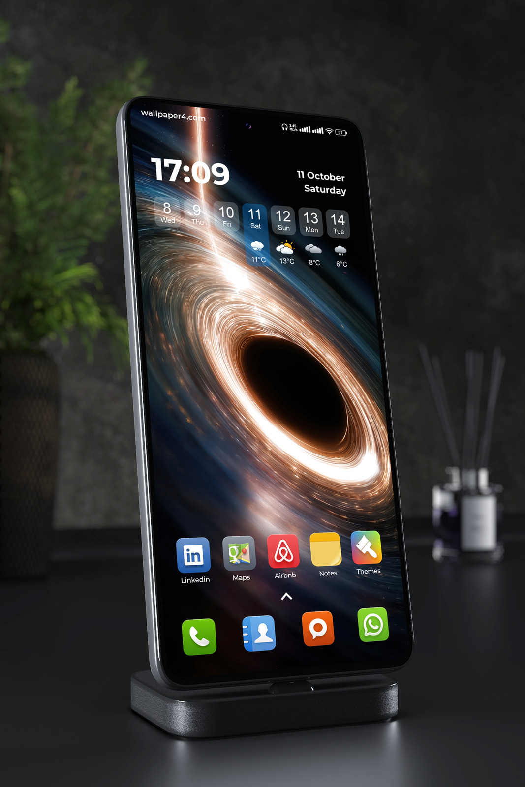 Mobile Wallpaper 4324 - Glowing Black Hole with Cosmic Light Rings