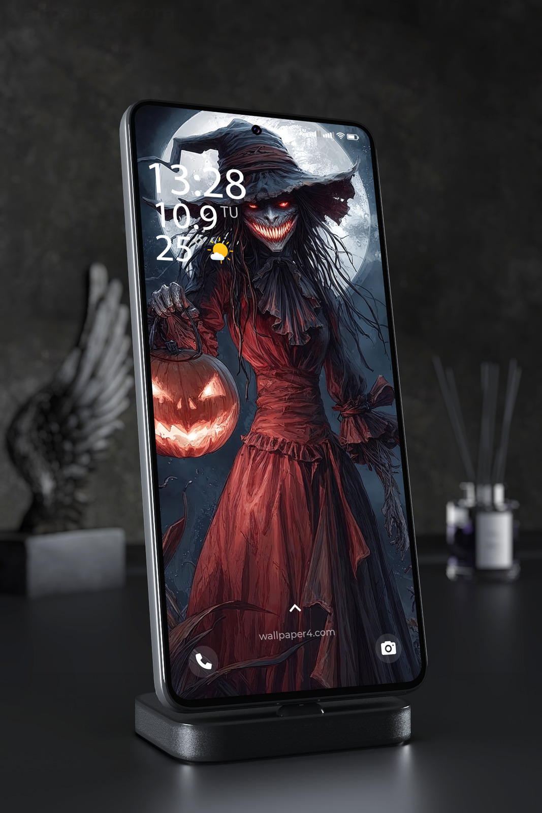 Mobile Wallpaper 4664 - Creepy Halloween Witch with Glowing Pumpkin