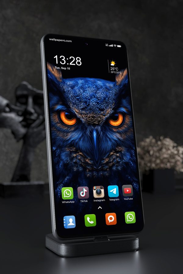 Mobile Wallpaper 5559 - Majestic Blue Owl with Fiery Orange Eyes