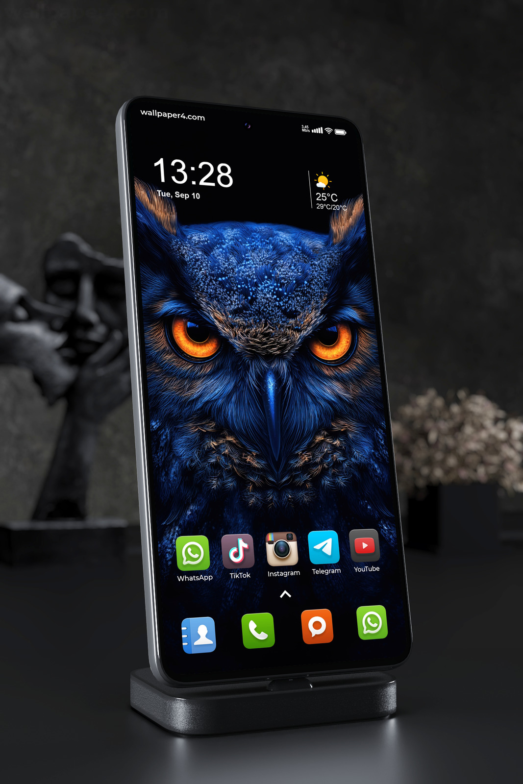 Mobile Wallpaper 5559 - Majestic Blue Owl with Fiery Orange Eyes