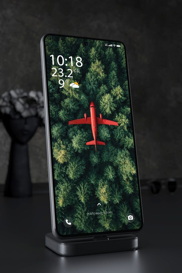 Mobile Wallpaper 6371 - Red Airplane Flying Over Dense Green Forest