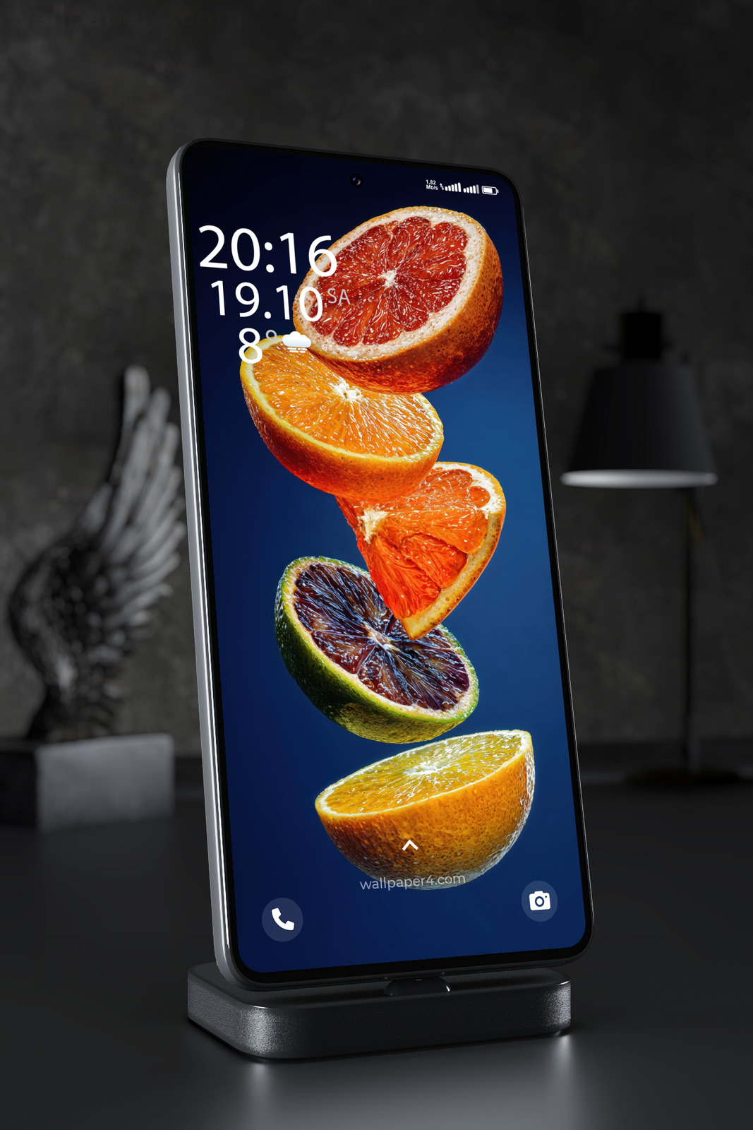 Mobile Wallpaper 7070 - Floating Citrus Slices on Deep Blue Background