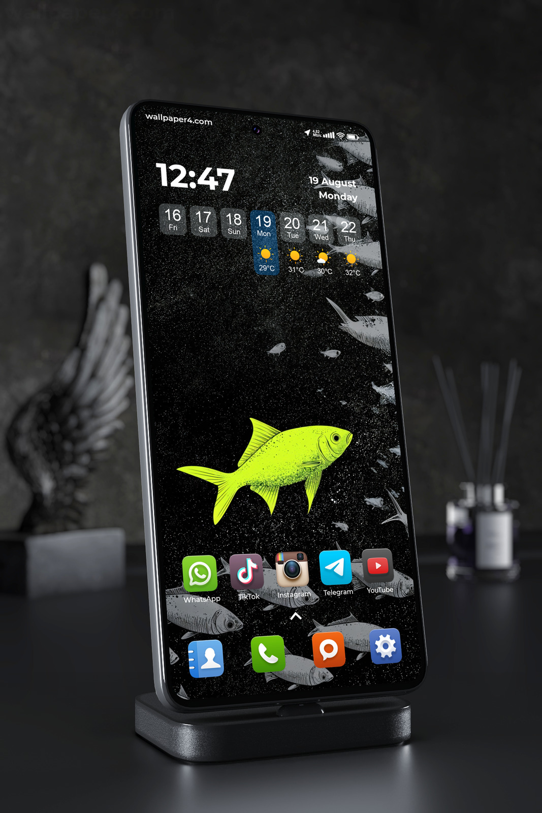 Phone Wallpaper 7170 - Neon Green Fish in a Dark Cosmic Ocean