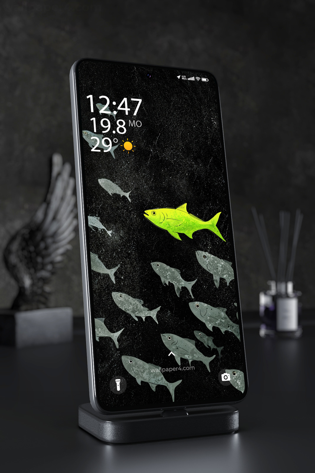 Mobile Wallpaper 7170 - Neon Green Fish in a Dark Cosmic Ocean