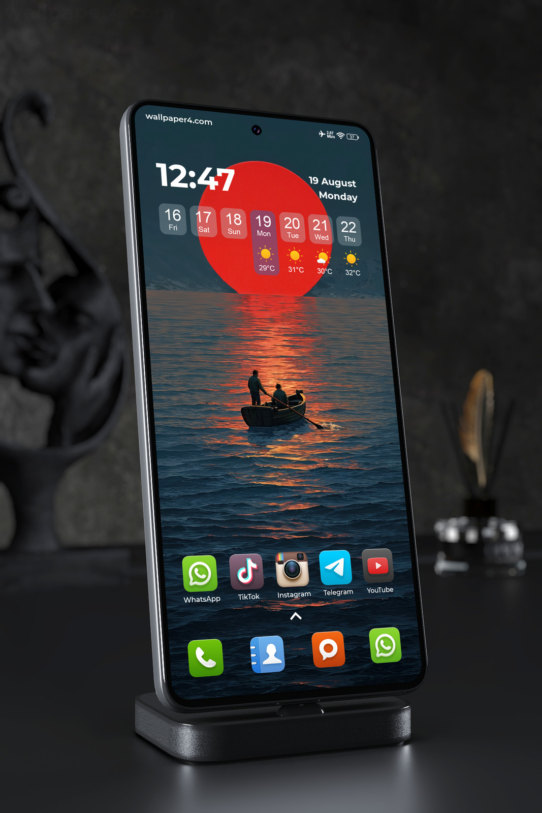 Phone Wallpaper 7334 - Crimson Sun Over a Dark Ocean Journey