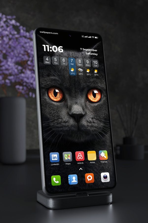 Phone Wallpaper 7774 - Black Cat with Glowing Amber Eyes Portrait