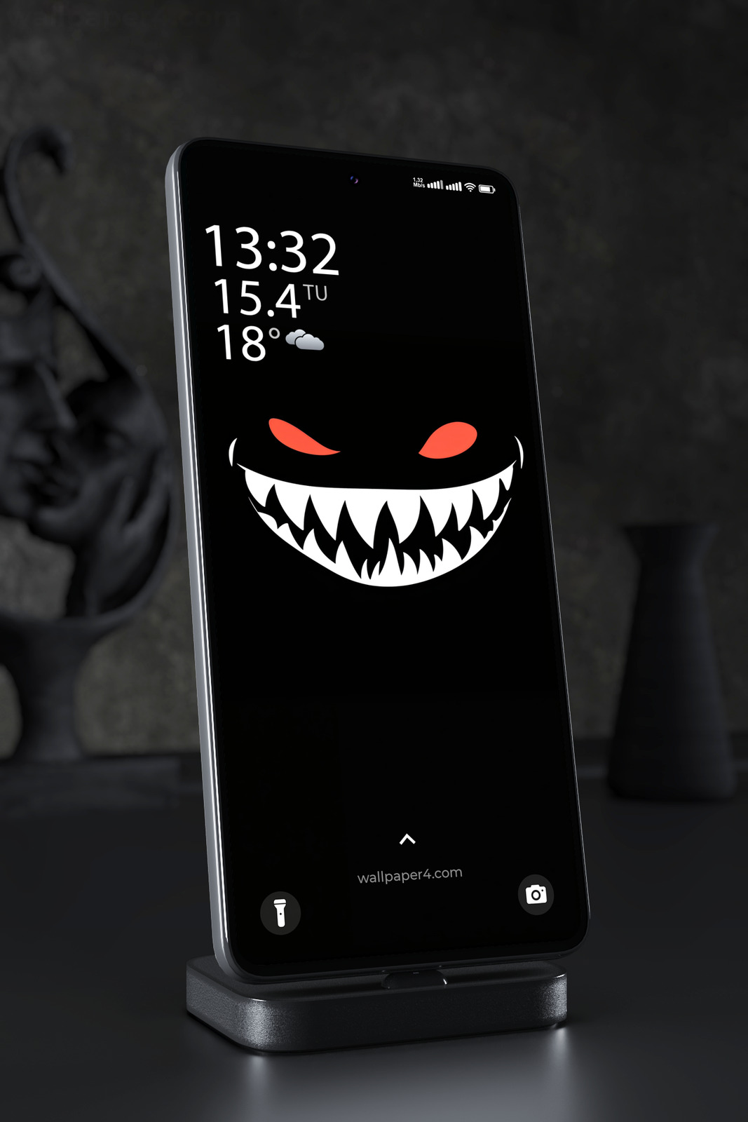 Phone Wallpaper 8117 - Sinister Red-Eyed Grin on a Black Background