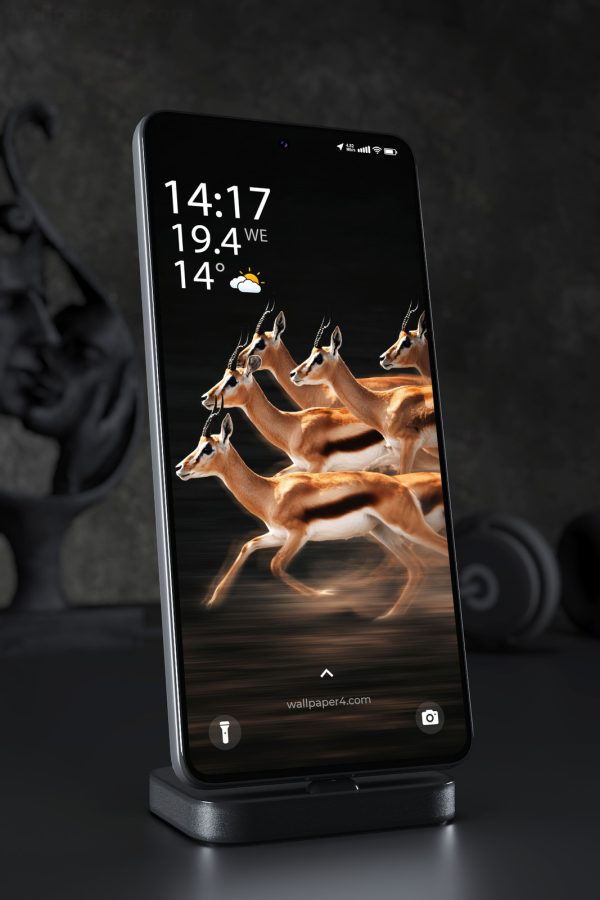 Phone Wallpaper 8293 - Running Gazelle Herd on a Dramatic Black Background