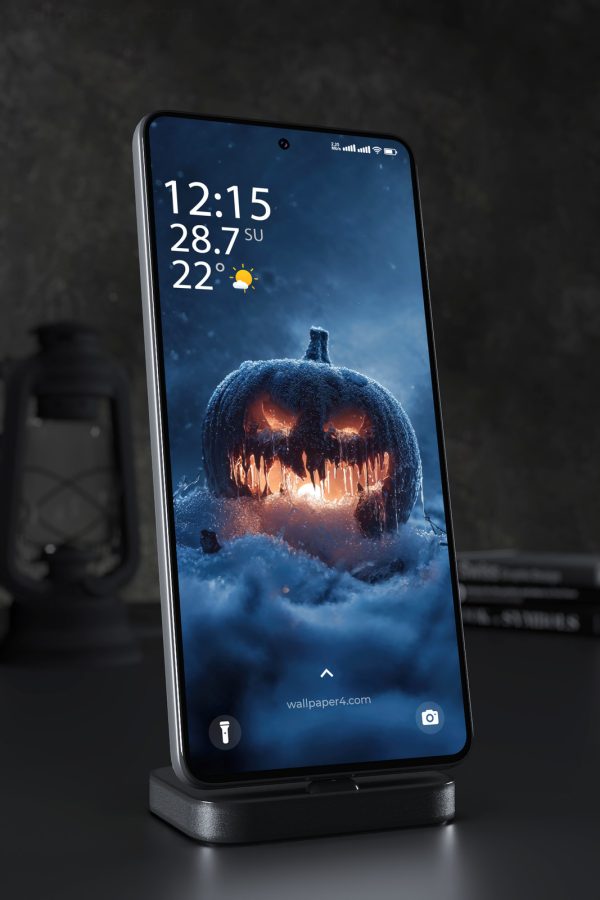 Phone Wallpaper 8448 - Frozen Halloween Pumpkin Glowing in the Snow