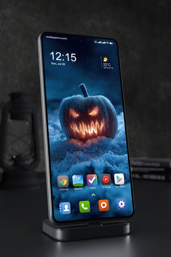 Mobile Wallpaper 8448 - Frozen Halloween Pumpkin Glowing in the Snow