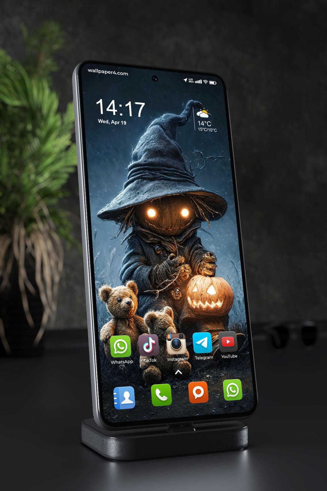 Mobile Wallpaper 8454 - Dark Halloween Scarecrow with Glowing Pumpkin