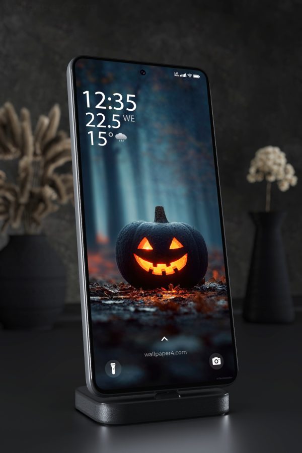 Mobile Wallpaper 8470 - Glowing Halloween Pumpkin in a Dark Forest