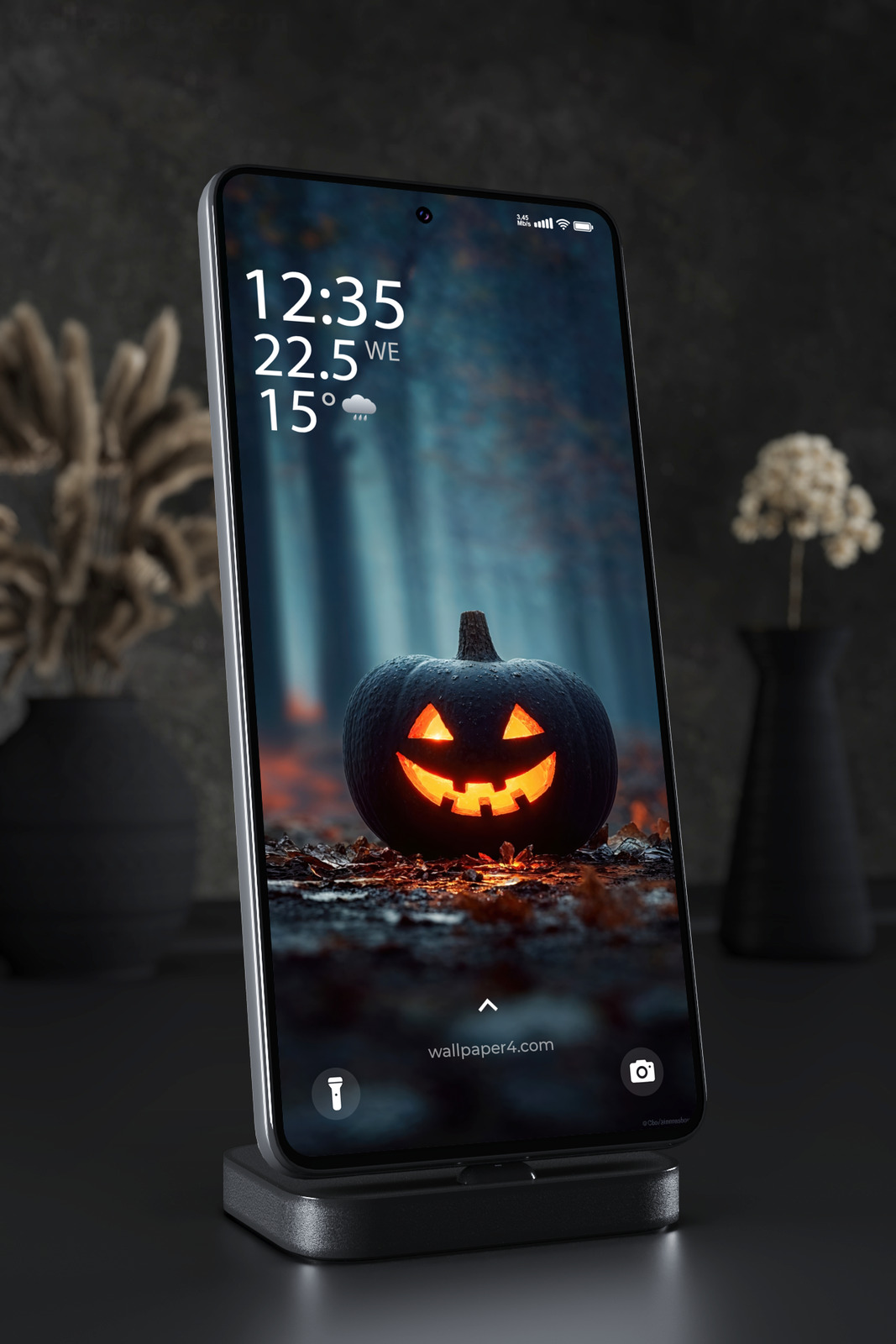 Mobile Wallpaper 8470 - Glowing Halloween Pumpkin in a Dark Forest
