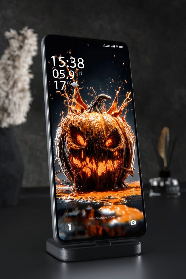 Mobile Wallpaper 8561 - Dark Melting Halloween Pumpkin with Fiery Glow