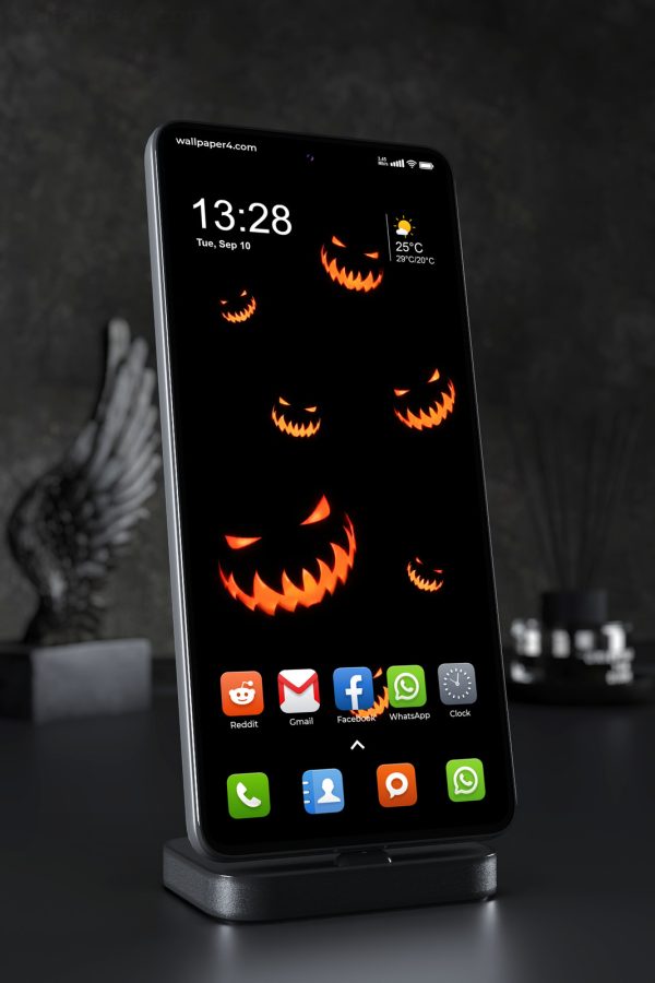 Mobile Wallpaper 9028 - Floating Orange Jack-o-Lantern Faces on Black