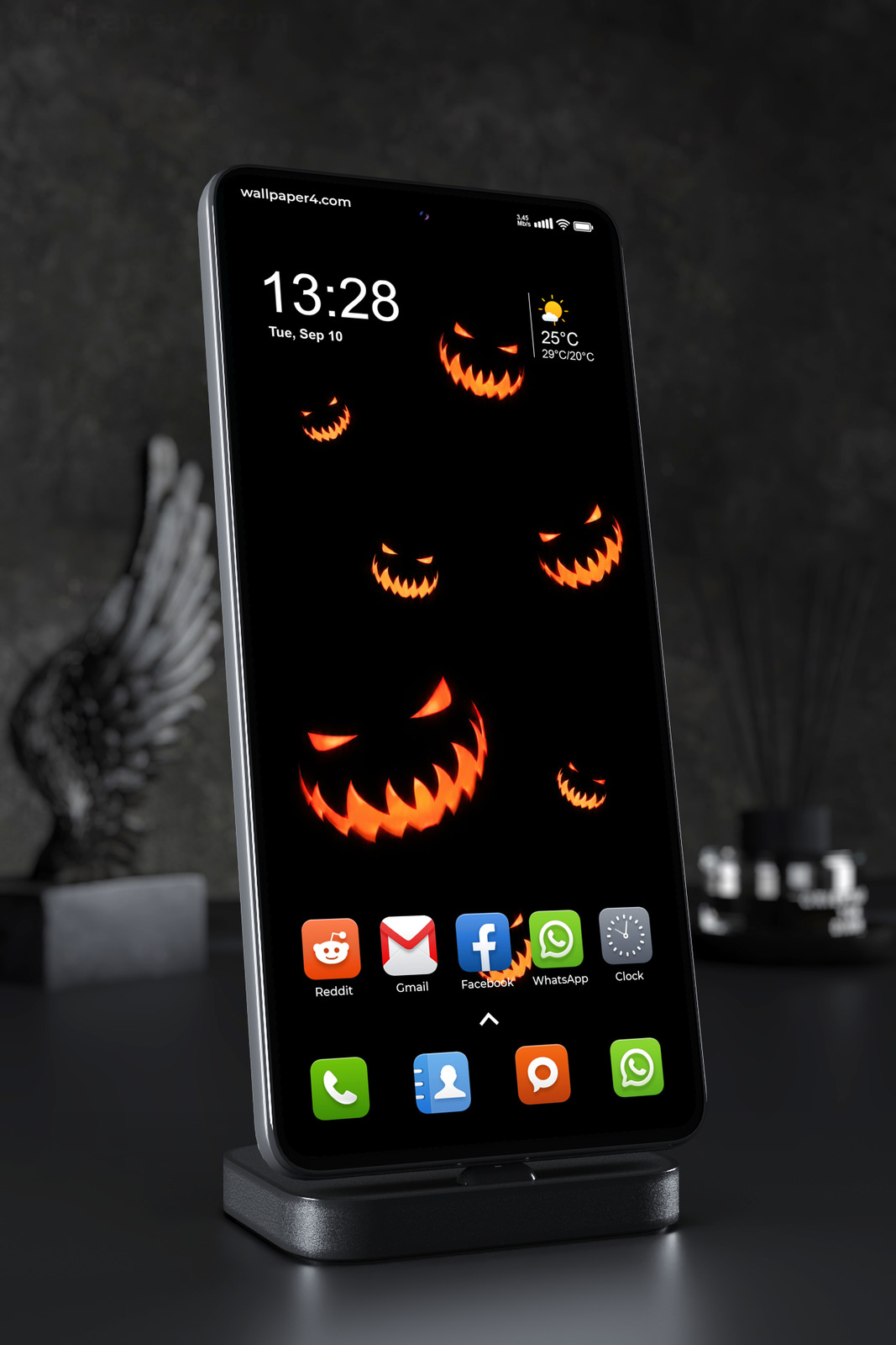 Mobile Wallpaper 9028 - Floating Orange Jack-o-Lantern Faces on Black